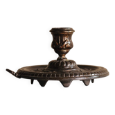 Bronze cellar rat hand candle holder