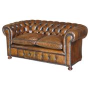 Restored leather Chesterfield sofa, walnut legs.