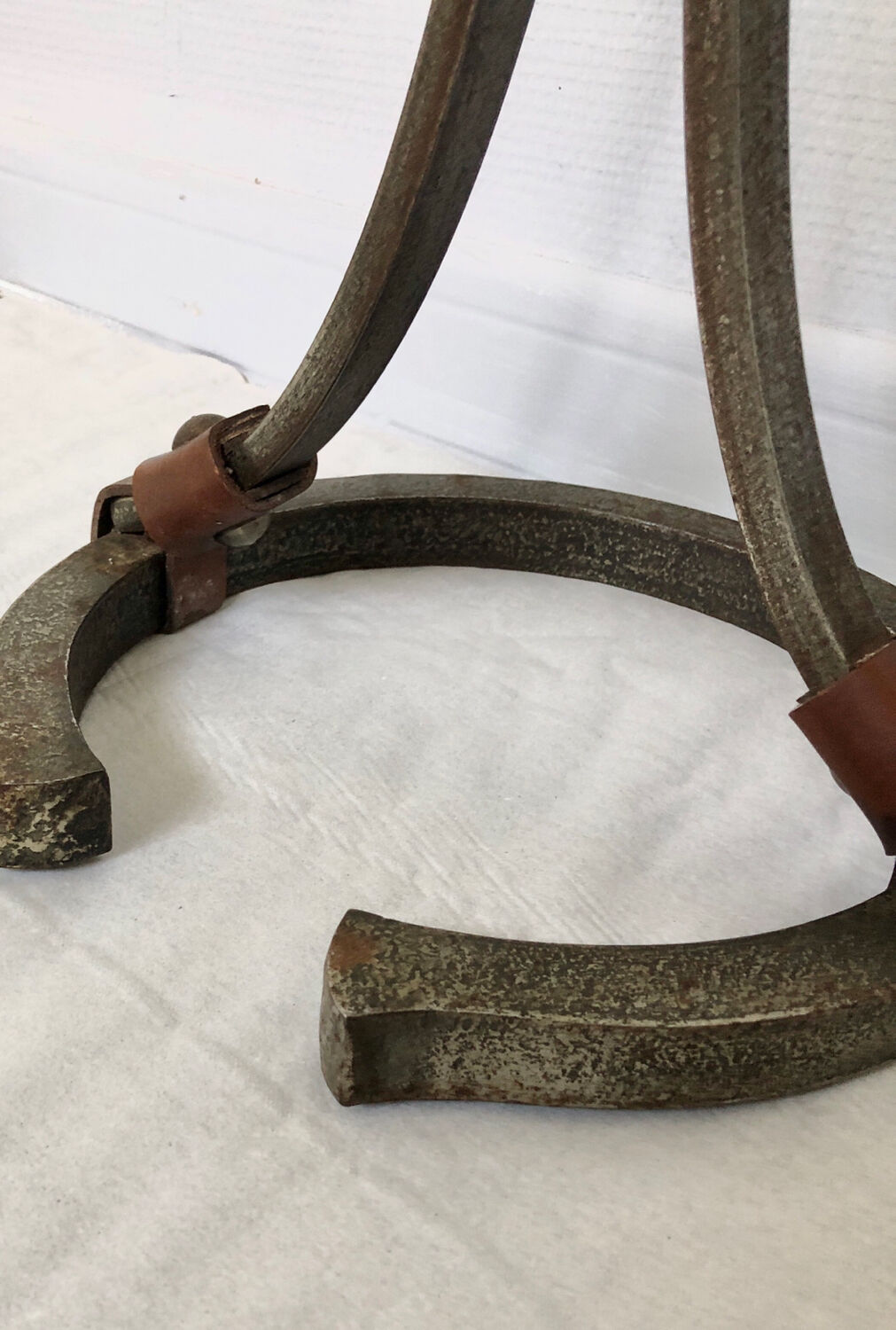 Hammered wrought iron and leather floor lamp by Jean Pierre Rickaert, 1950s