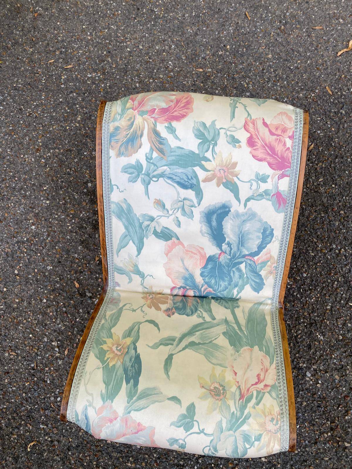 Kneeling prayer desk with rocking footrest in solid wood, curule style & floral fabric.