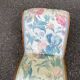 Kneeling prayer desk with rocking footrest in solid wood, curule style & floral fabric.