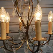 Remarkable cage chandelier with 6 lights and complete crystal pendants in working condition.