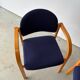Set of two stackable beech chairs in curved Scandinavian style from IKEA.
