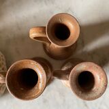 Trio of stoneware candle holders