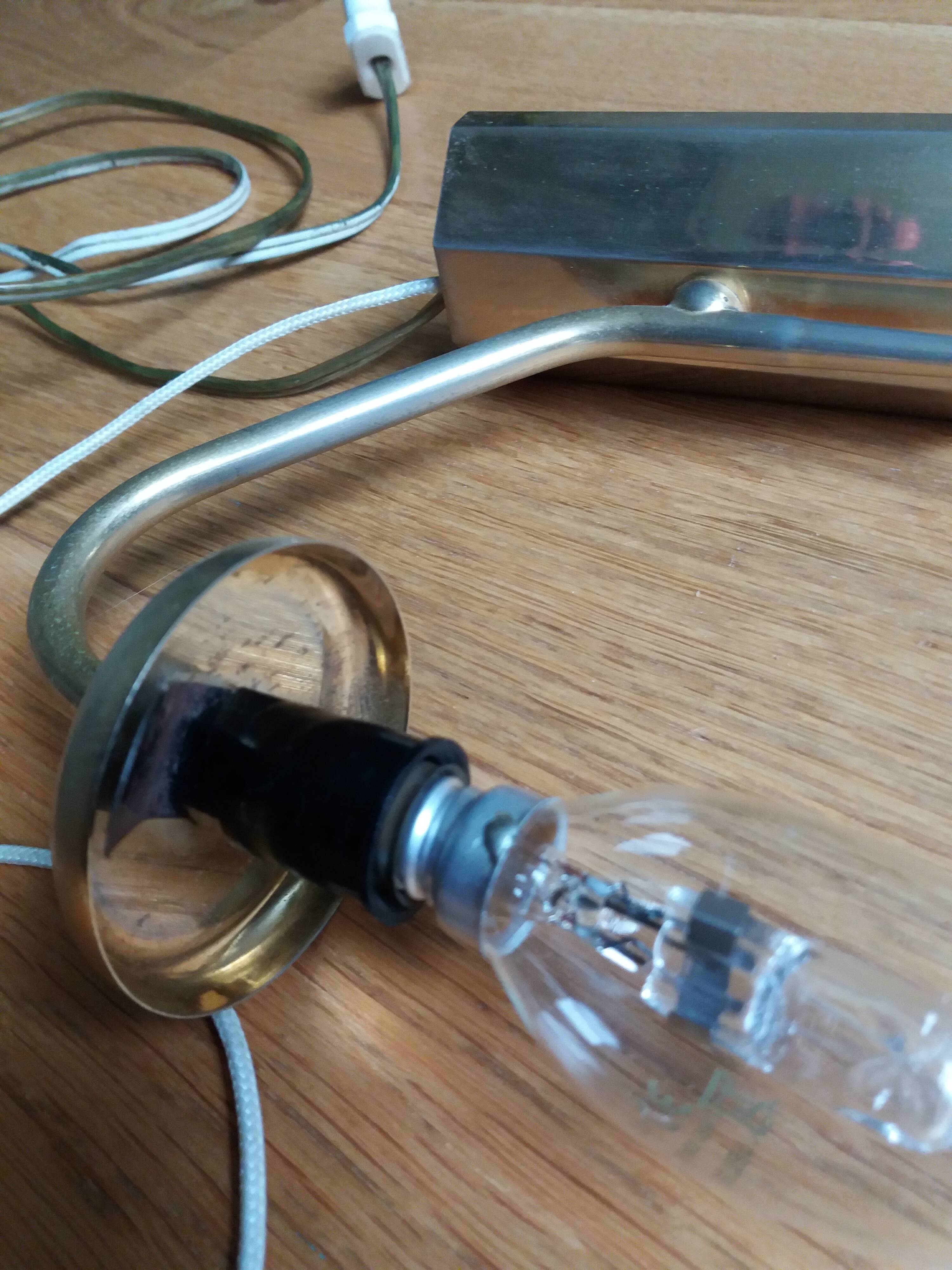 Brass wall lamp and pineapple glass