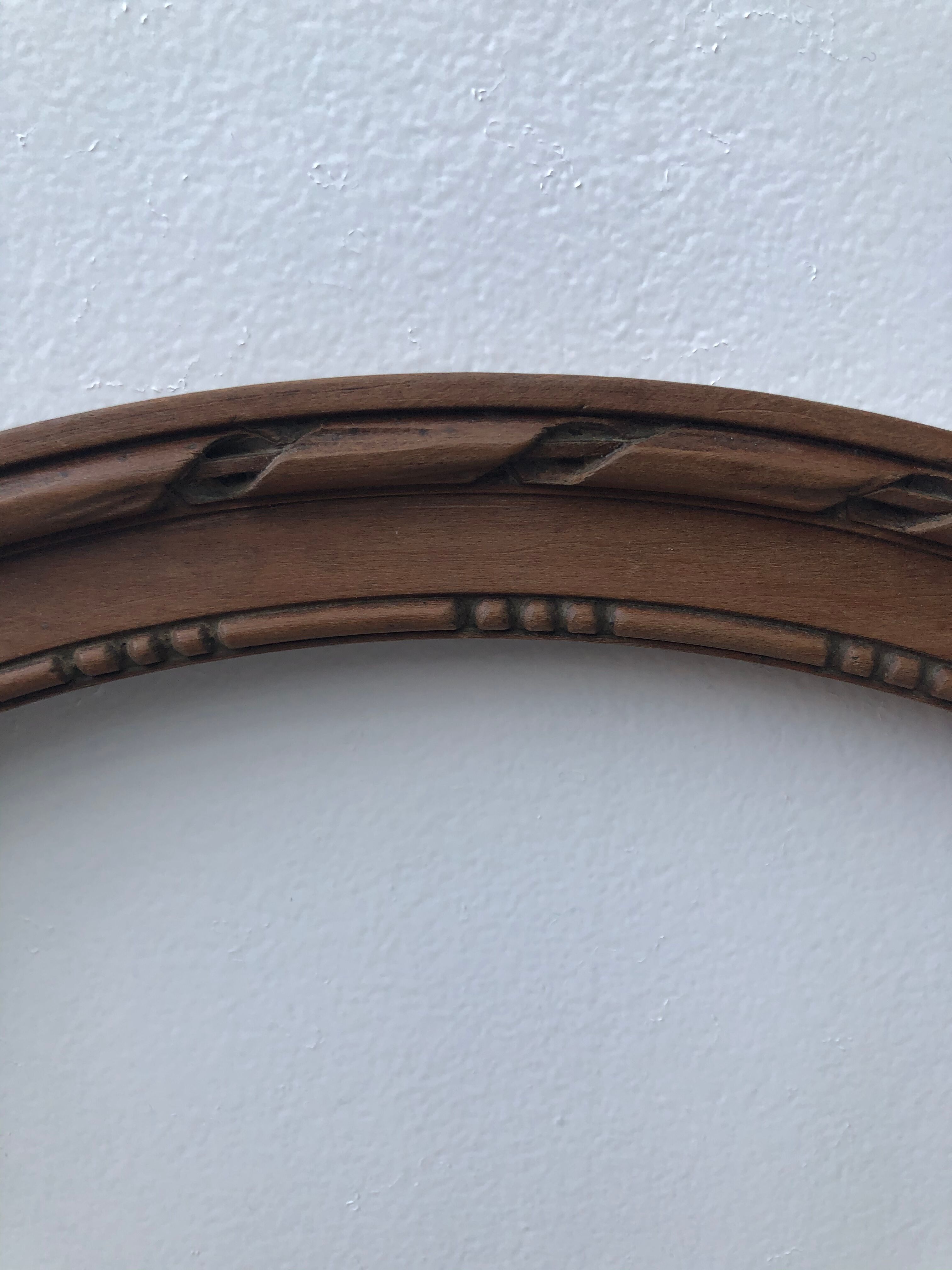 Wooden oval frame