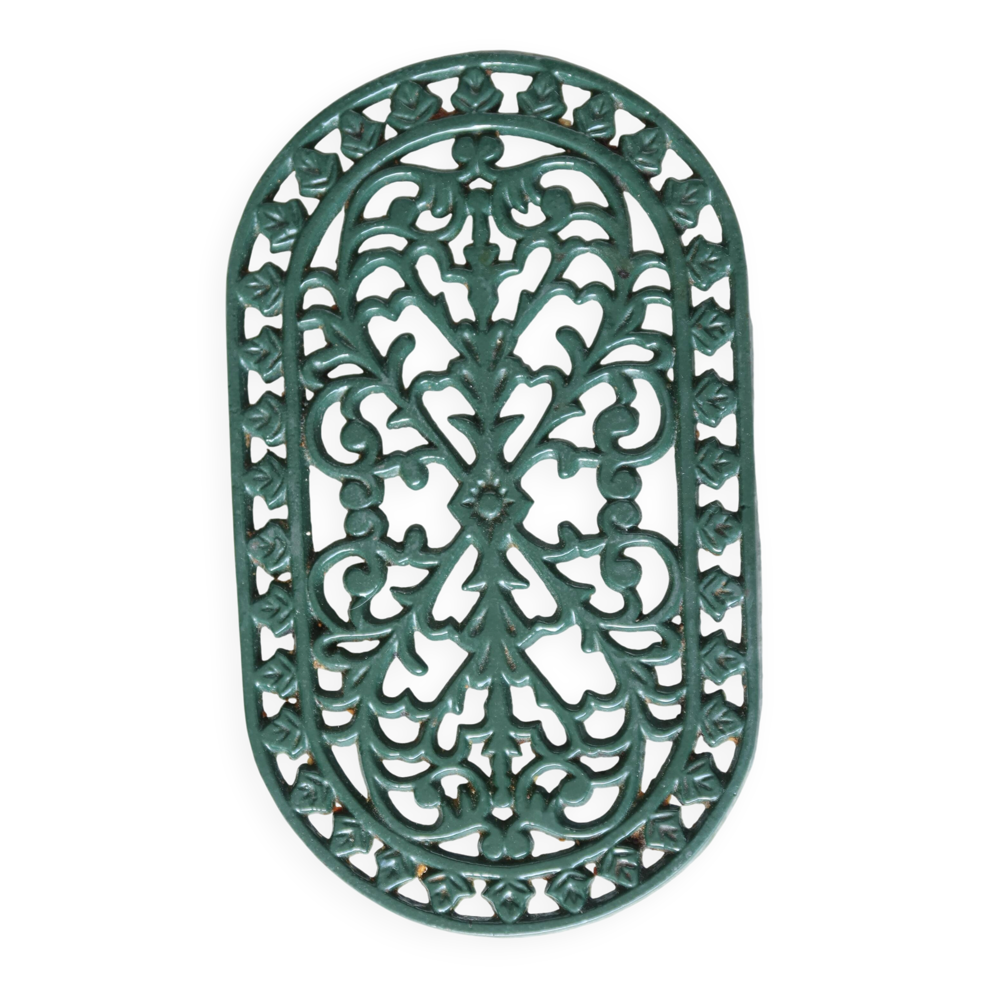 Vintage dark green cast iron oval trivet - Openwork design