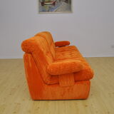 Orange corduroy modular sofa, 1970s.