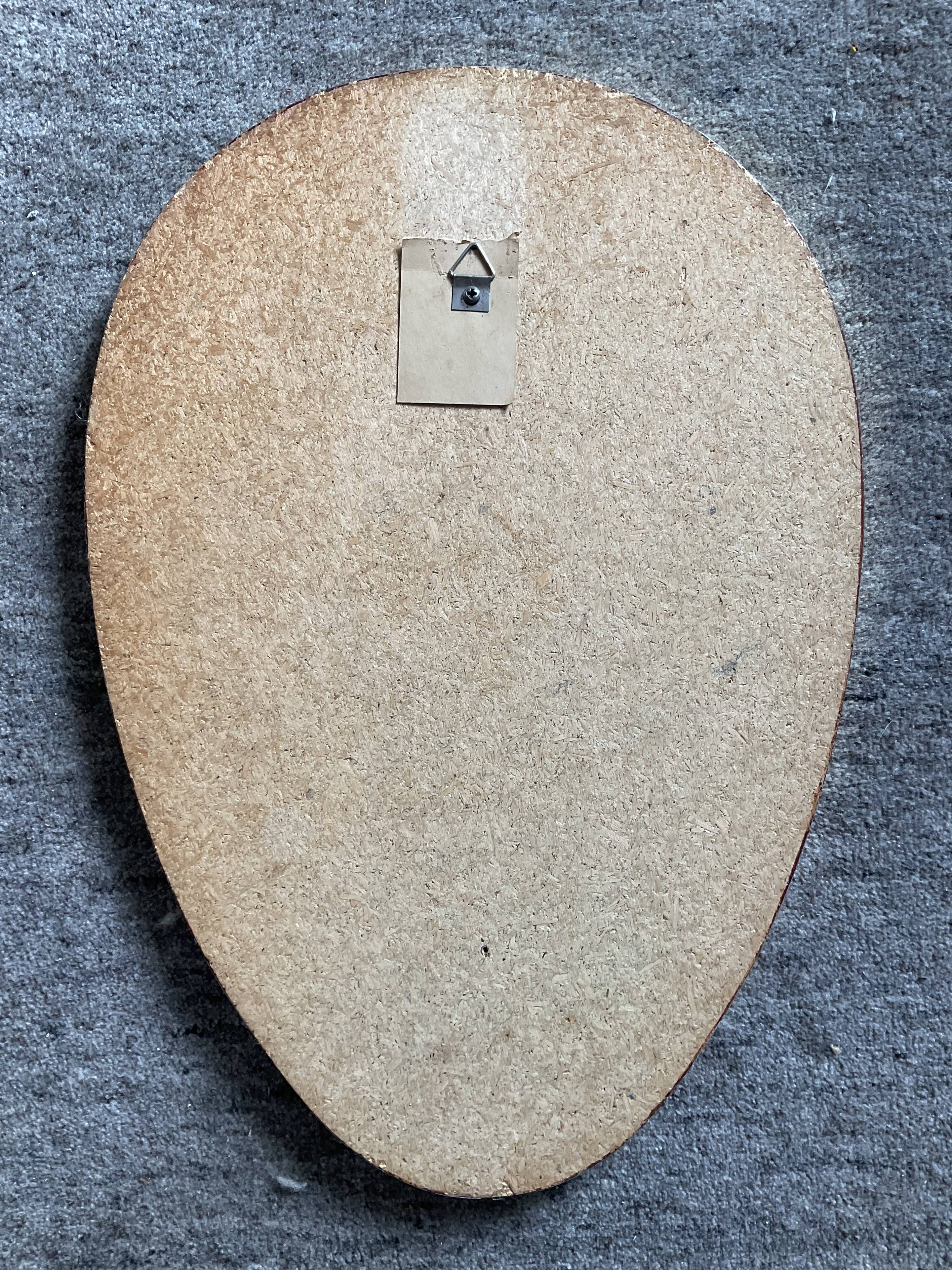 Asymmetrical free-form mirror from the 60s and 70s