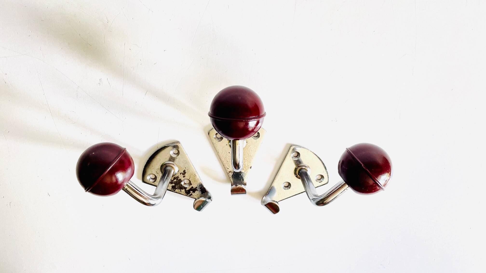 Chrome and bakelite coat hooks from the 70s
