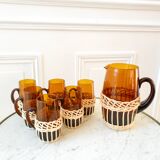 set of carafe and 6 cups in amber glass with wicker from the 70s