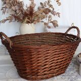 Large vintage dark wicker basket with handles