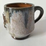Fleur-de-lis glazed earthenware mug