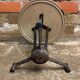 Vintage bistro table with black cast iron base and orange bakelite top, 1950s