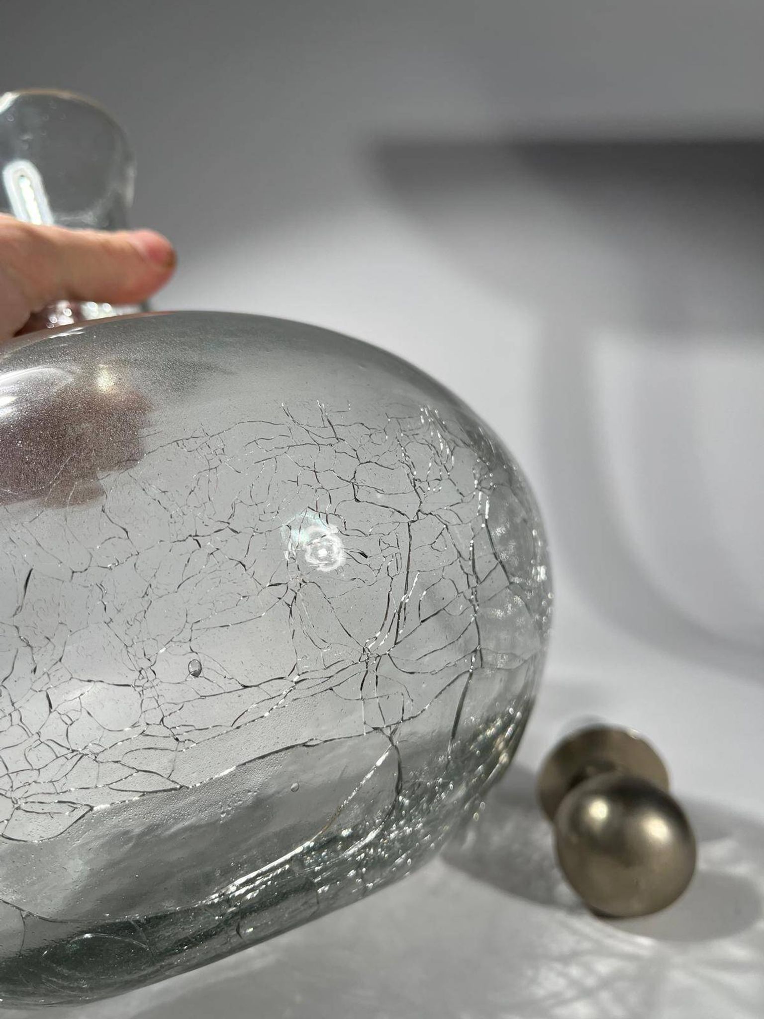 vintage cracked glass carafe with metal stopper