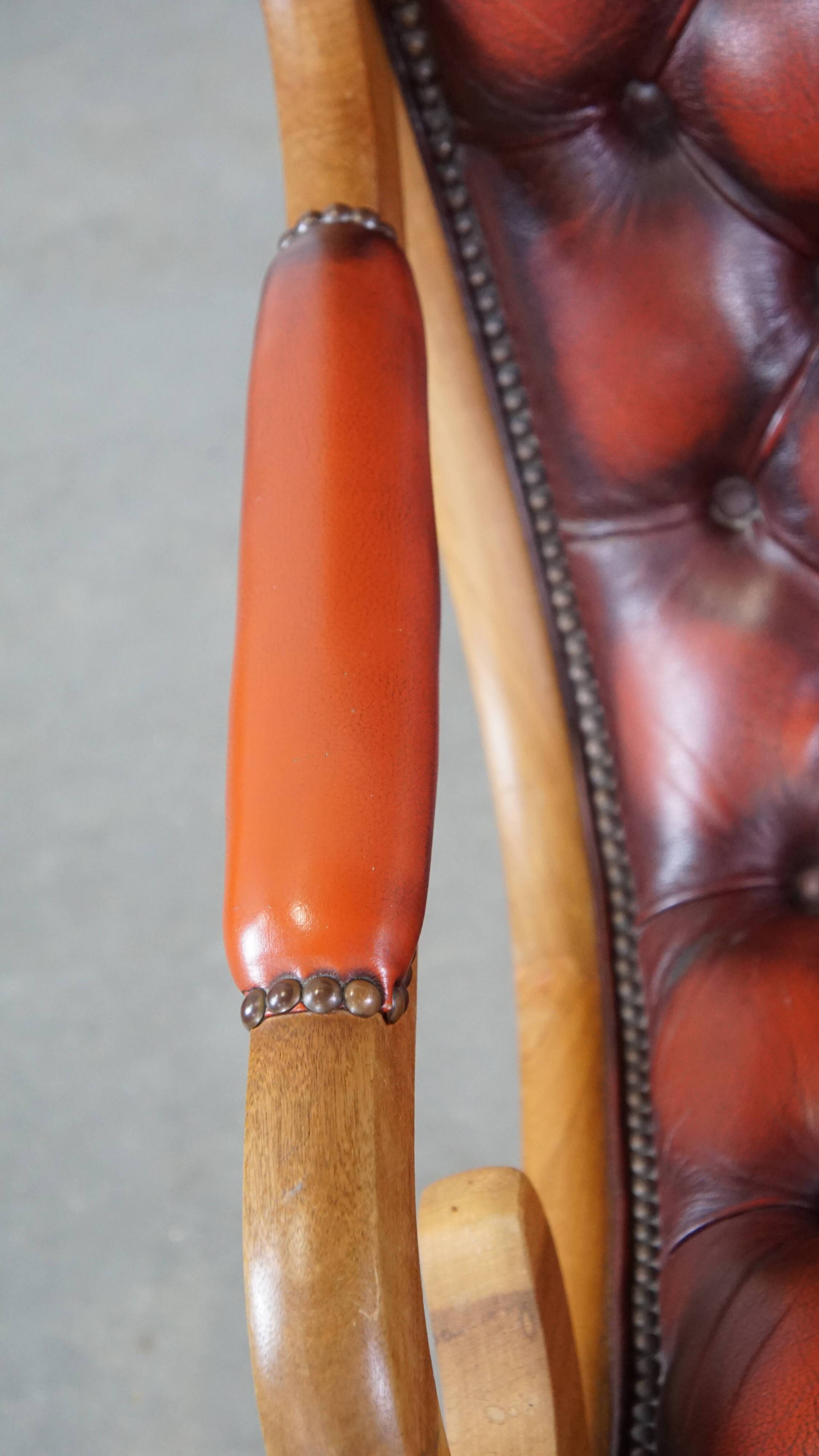 Red flame-grained English cow leather chesterfield armchair