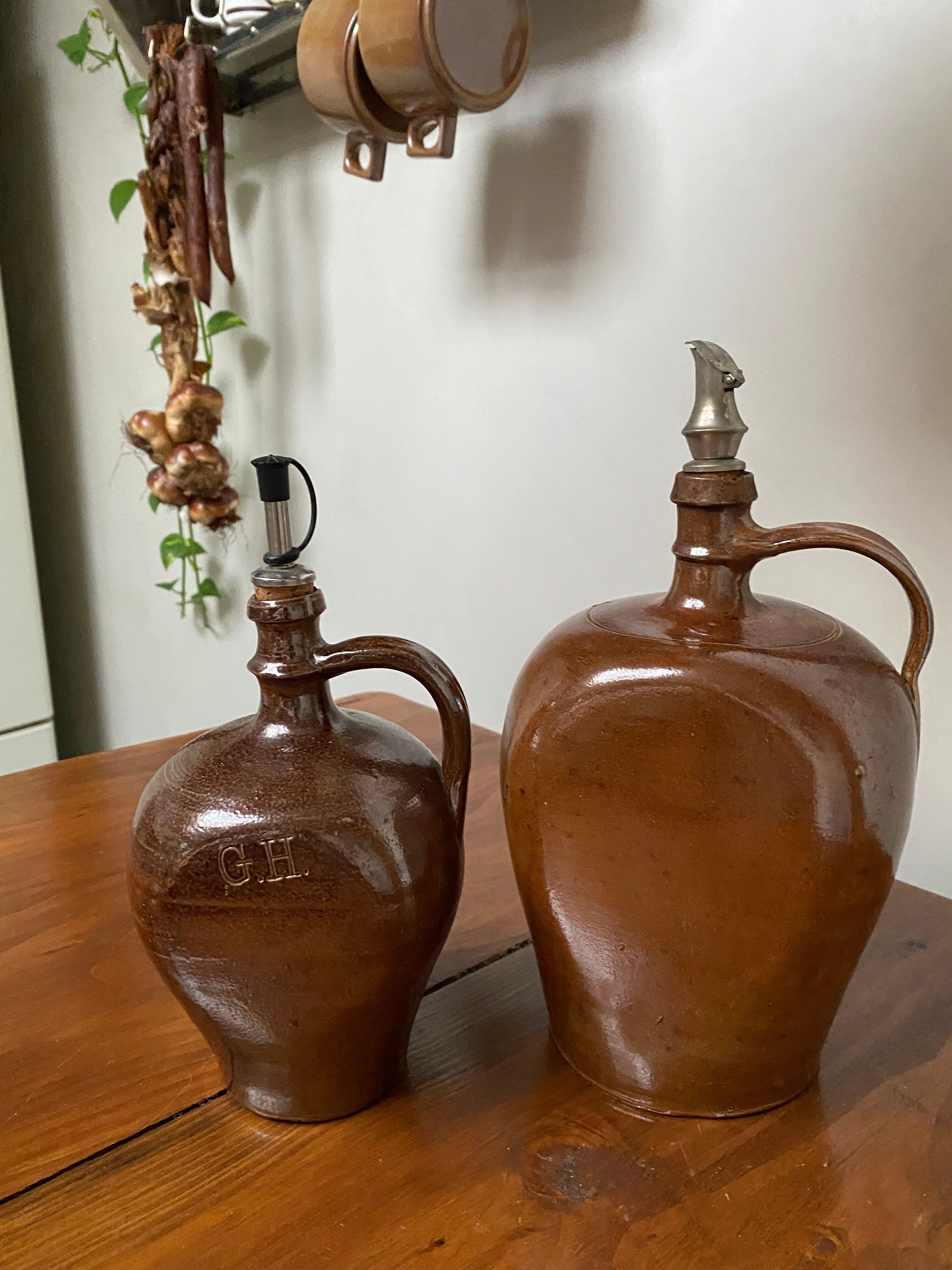 Pair of bottles in sandstone