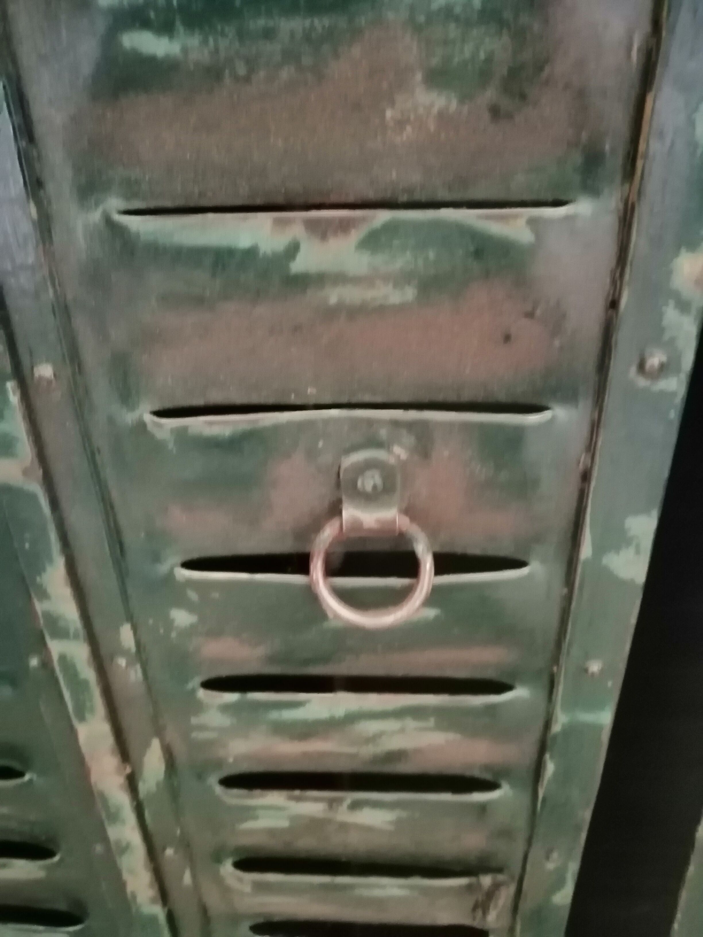 Lot of old green shutters in 4-part iron screen headboard