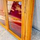 Vitrine murale en bois avec porte en verre