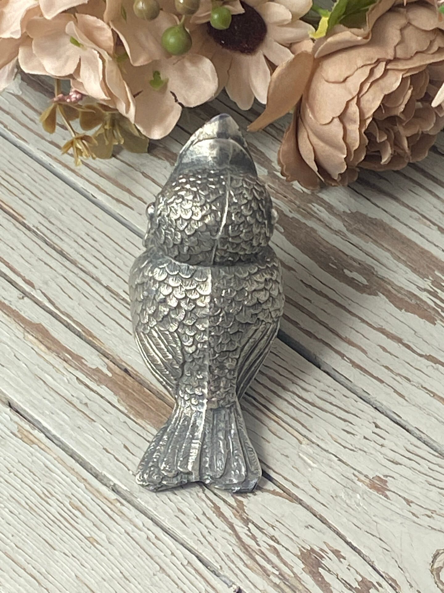Silver-plated bird