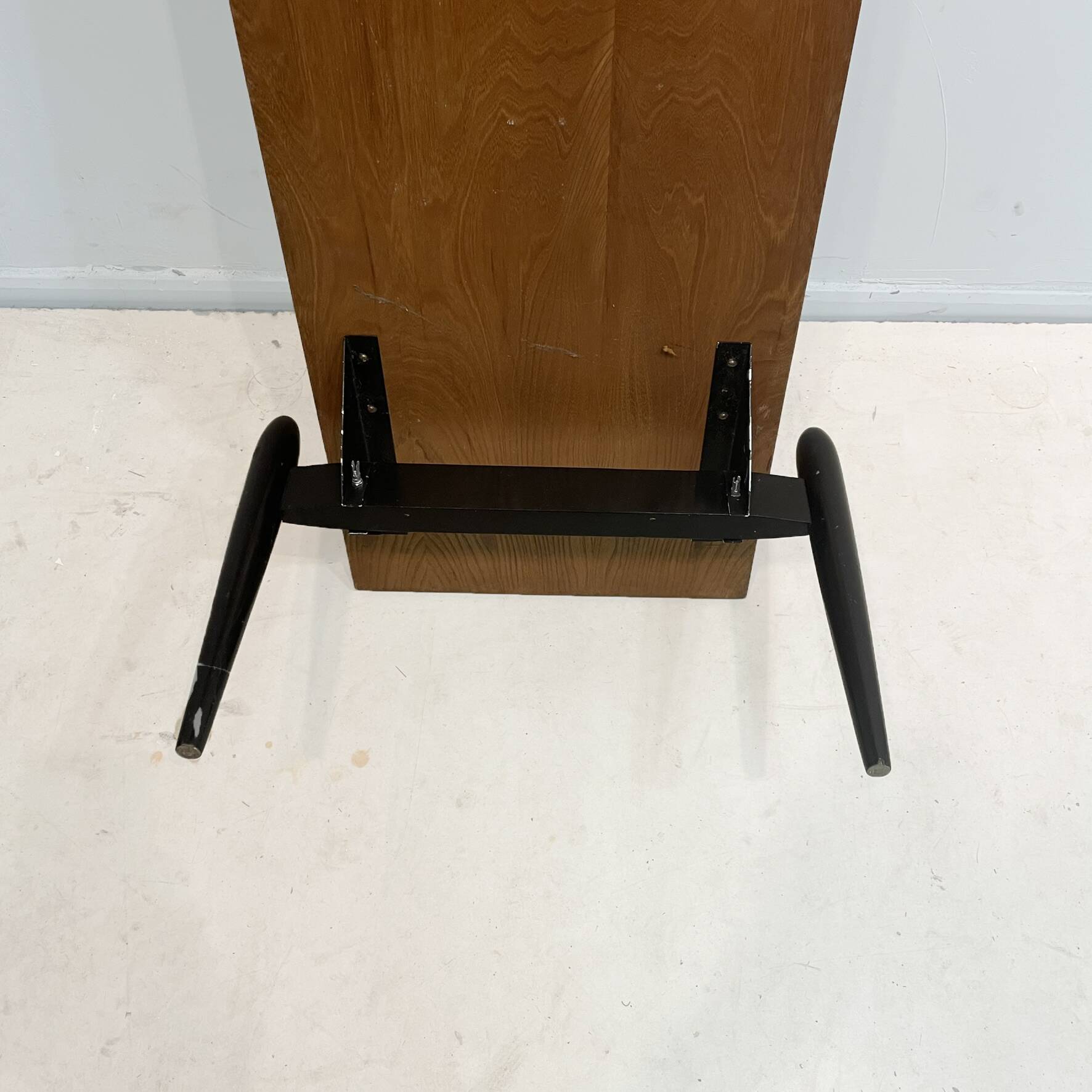 Large 1950s modernist coffee table – sculptural black base