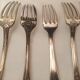 Set of mismatched silvered metal cutlery