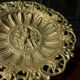 Footed fruit bowl in brass – relief mythological decoration – sty