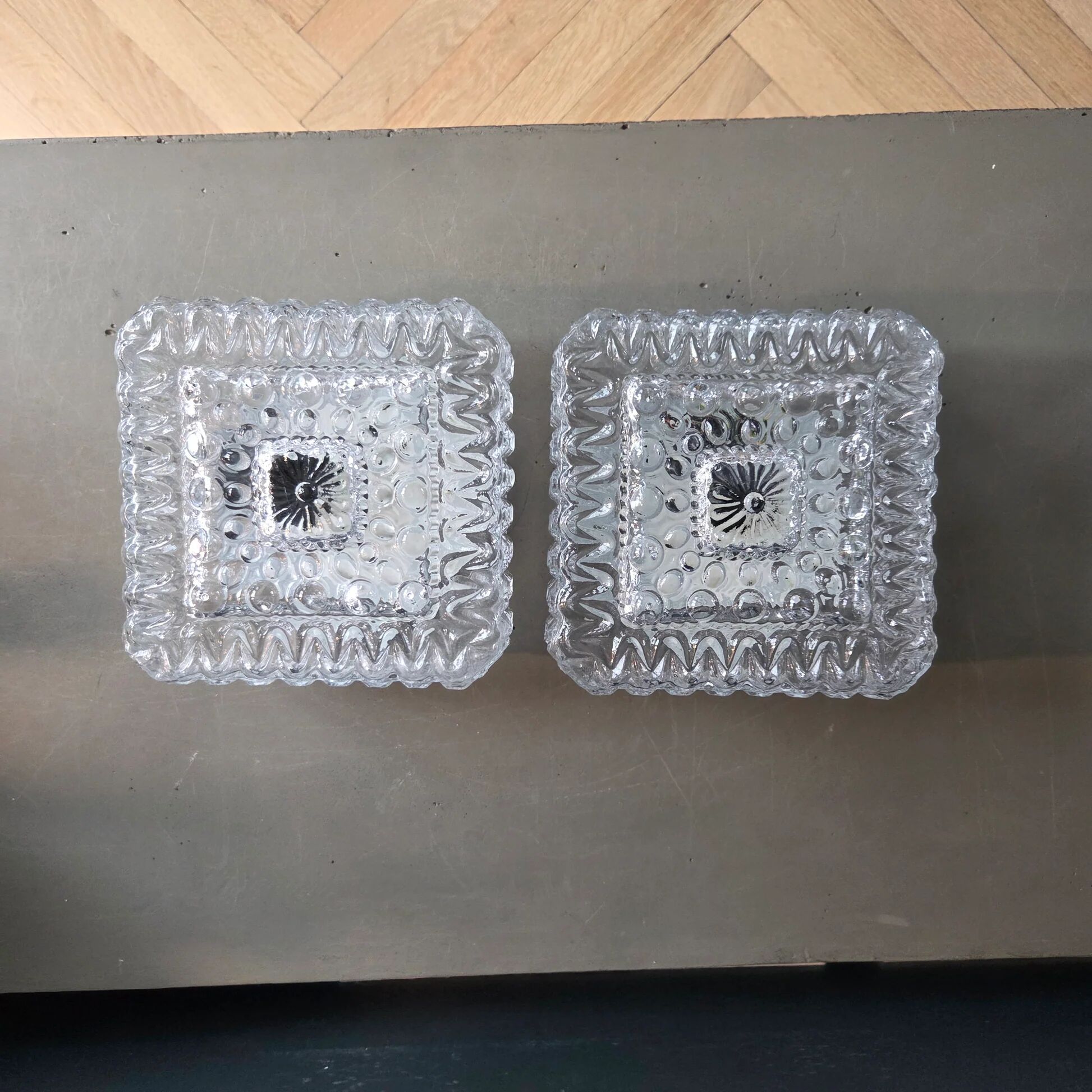 Pair of ceiling lights or moulded glass wall lights.