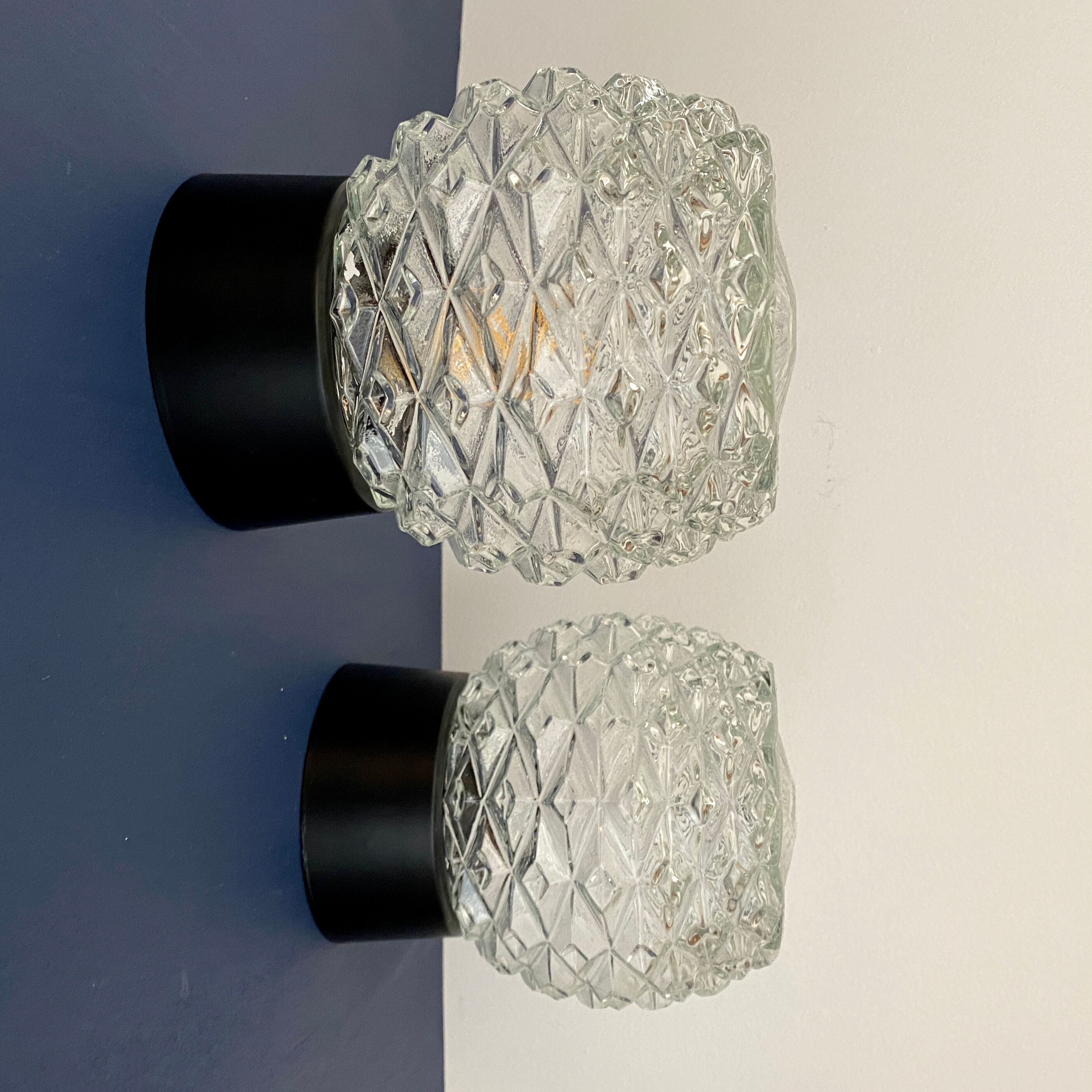 Pair of vintage wall lamps in molded glass and thermoplastic