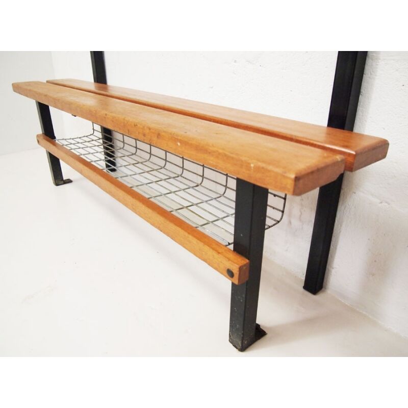 Locker room in gym with rail for coats