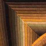 Kinetic tapestry with geometric pattern by Patrice Allard.