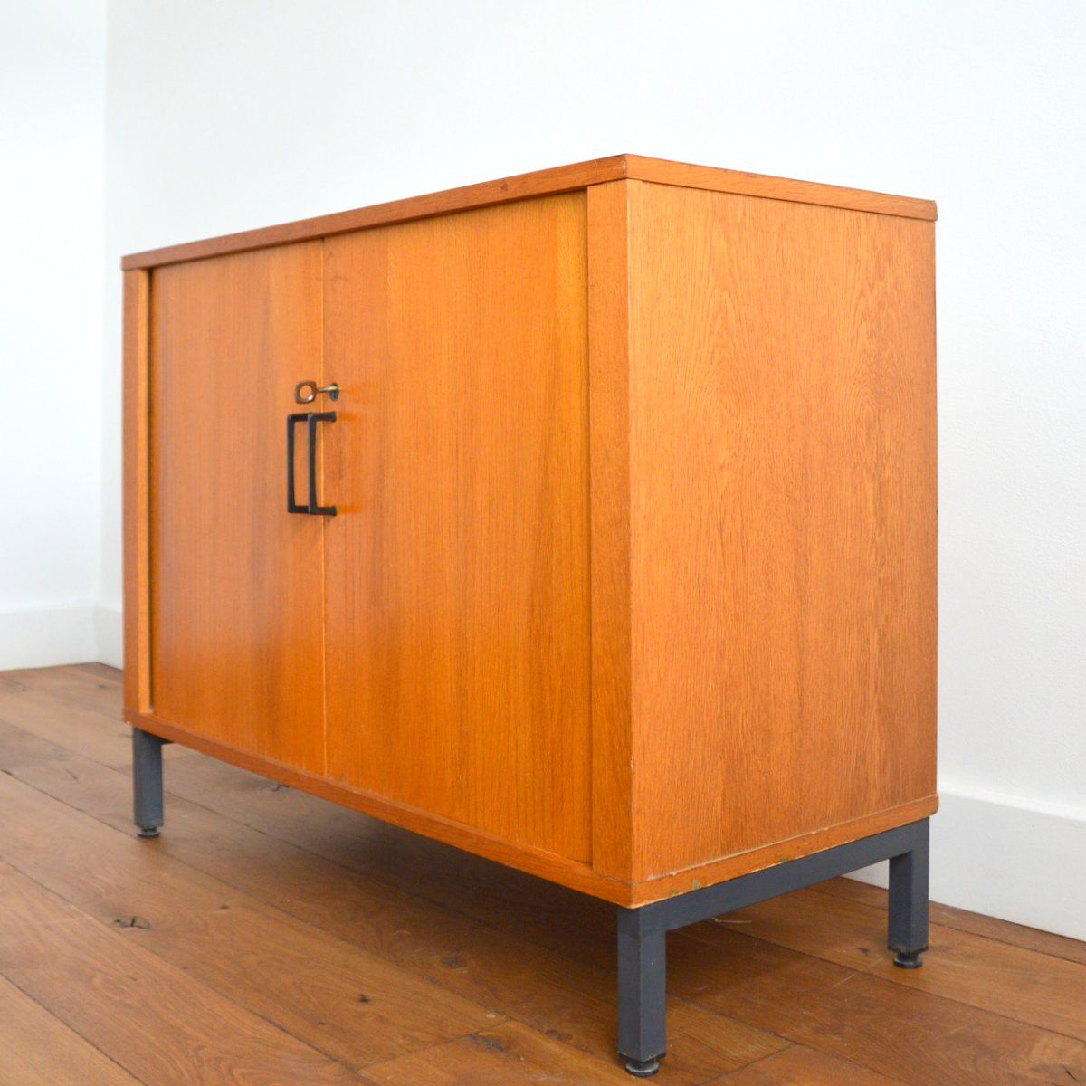 Storage cabinet with sliding curtain shutter 1950s