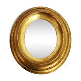 Golden oval mirror