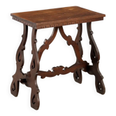 Small antique walnut table with openwork legs, 20th century.