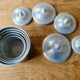 Series of 5 tin spice pots