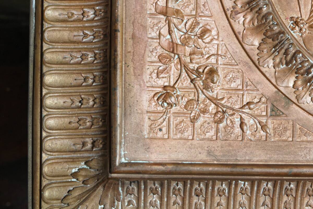 Repoussé copper plaque, early 19th century, in Neoclassical style.