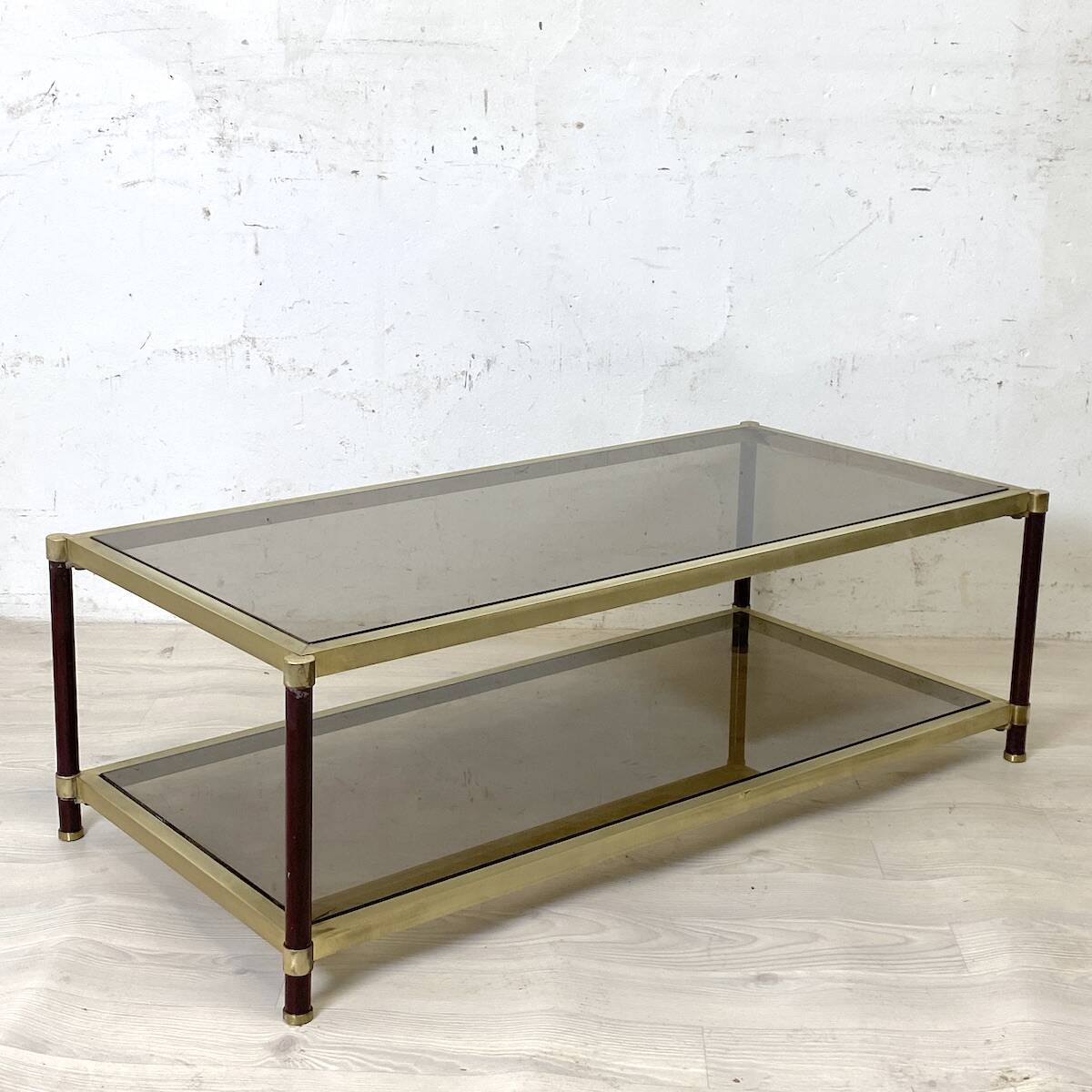 Vintage 1970s gold metal and smoked glass coffee table.