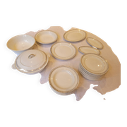 Table service in opaque porcelain with gold leaf.