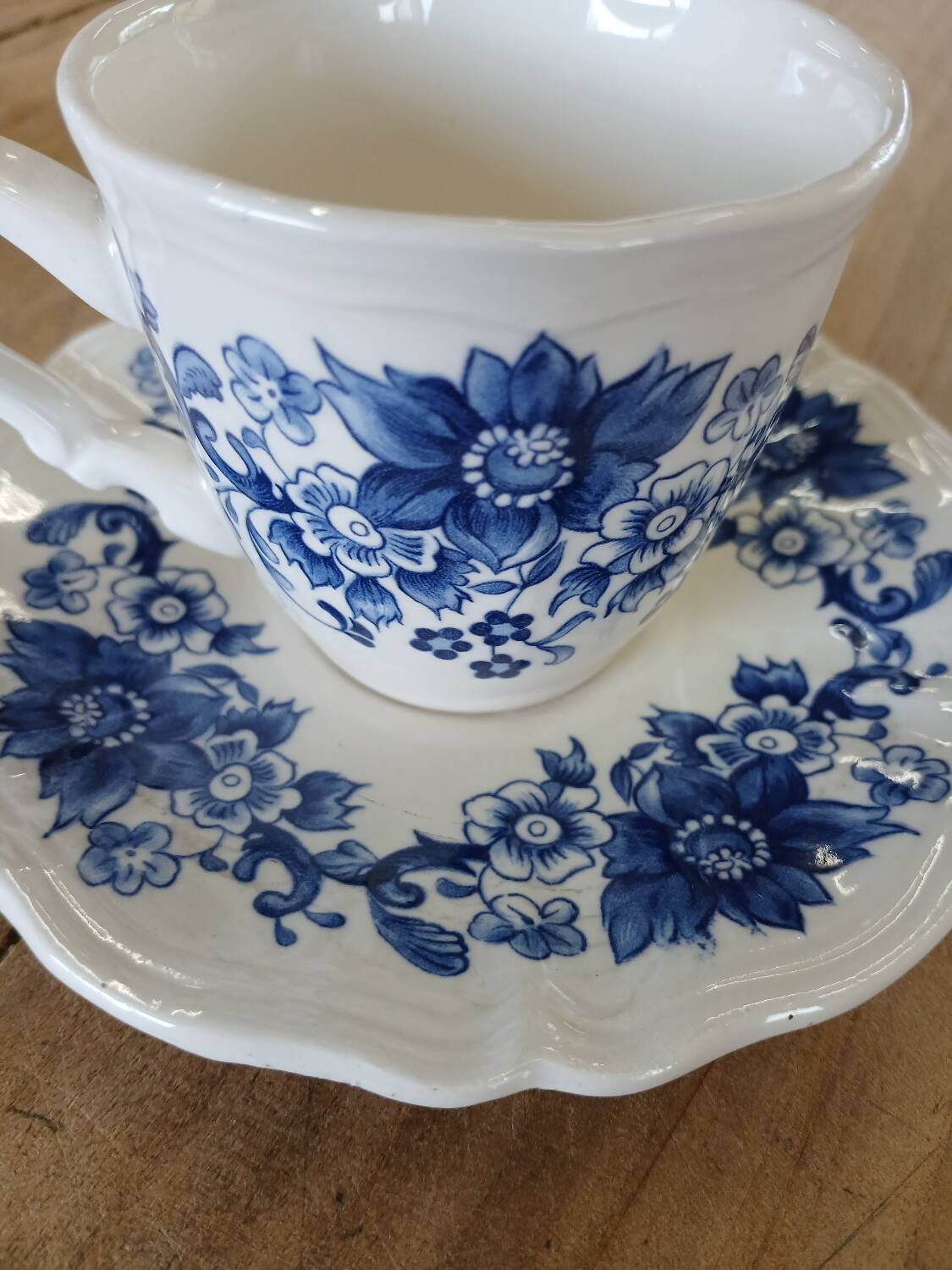 4 antique cups and saucers
