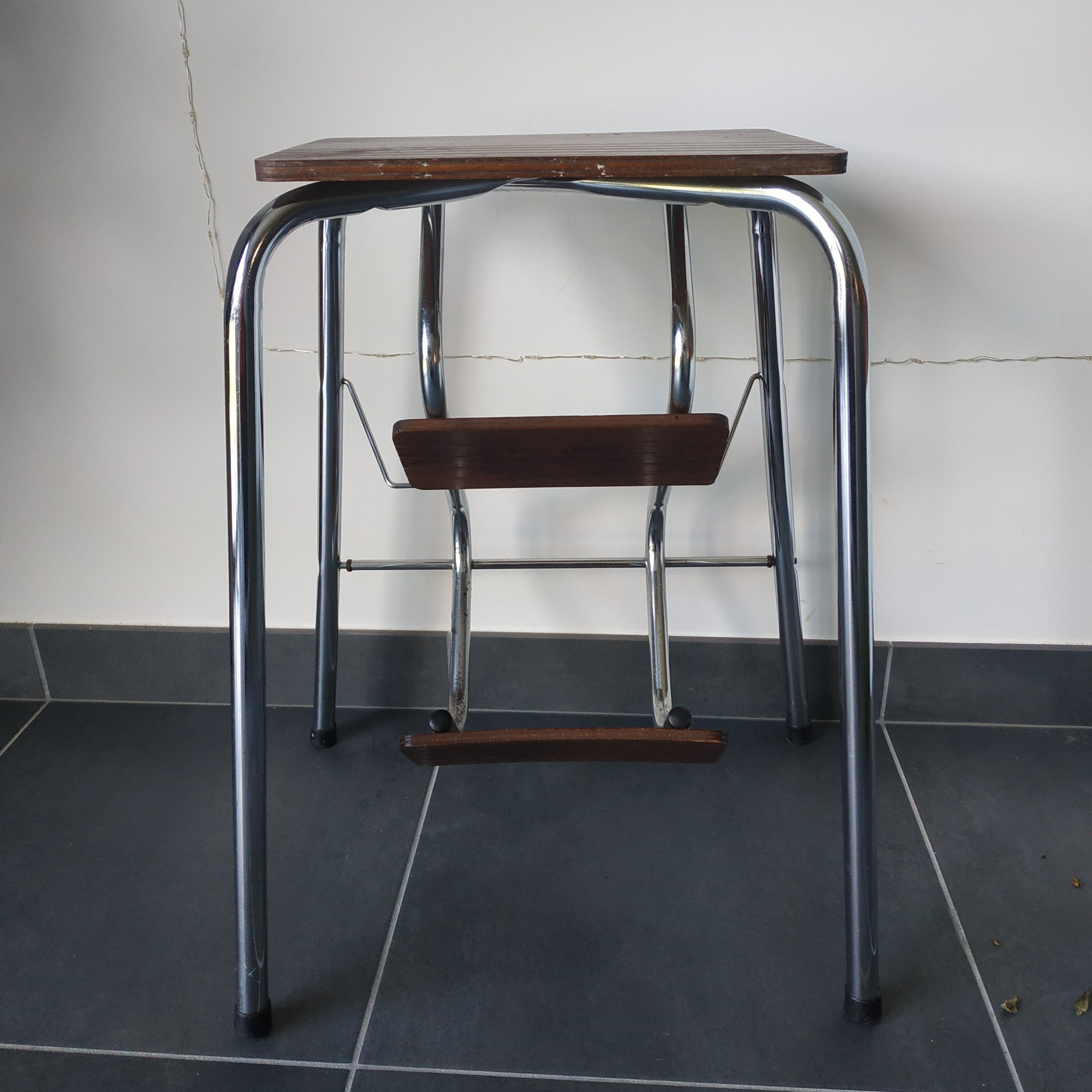 Old retractable wooden stepladder
