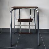 Old retractable wooden stepladder