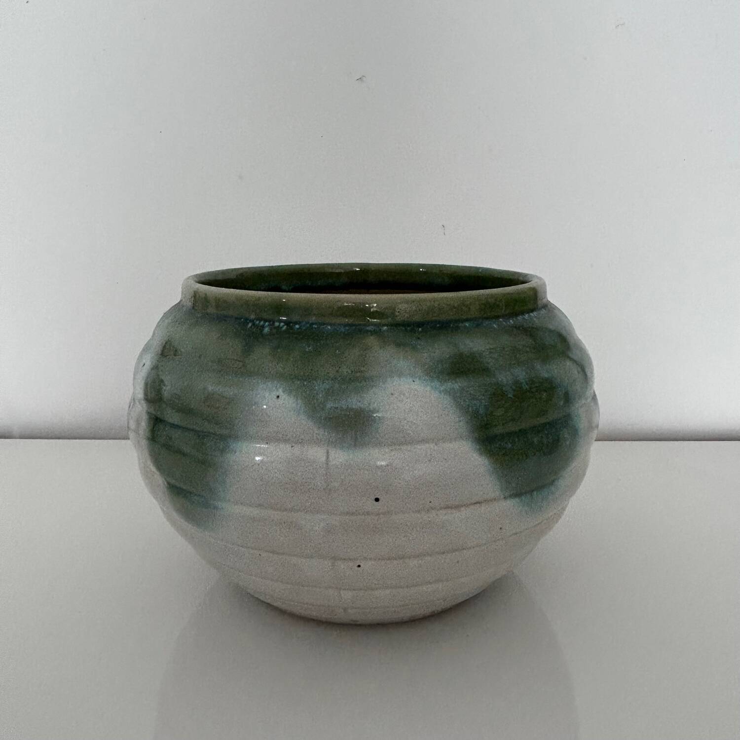 Green flamed stoneware pot