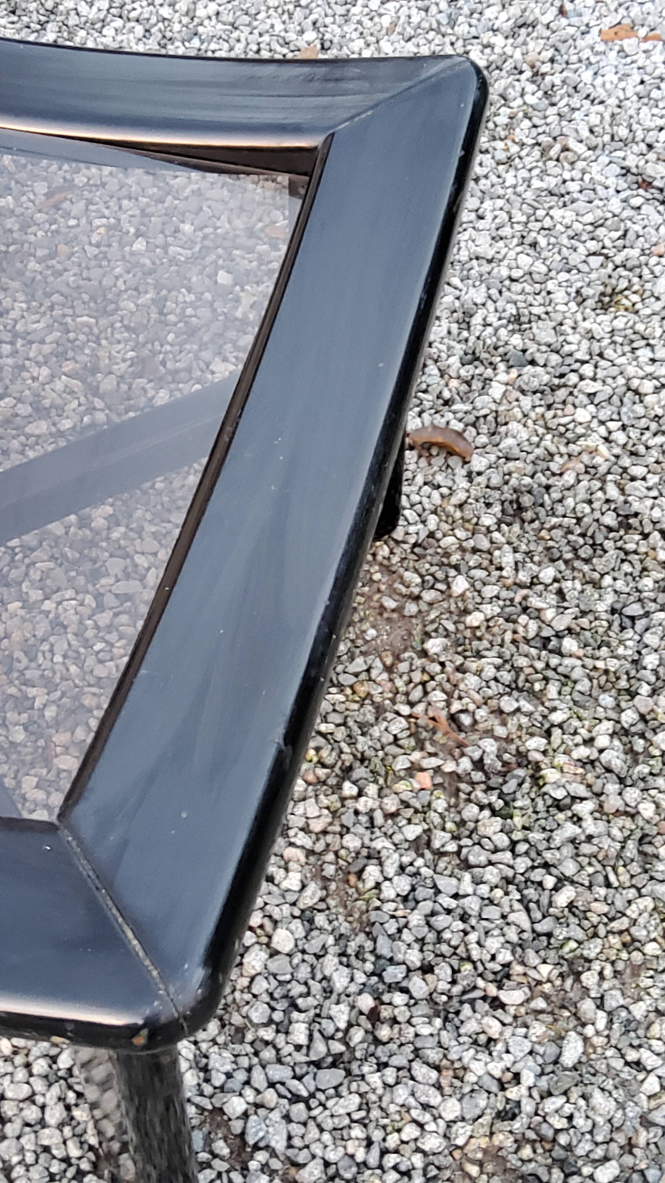 70s design coffee table in black lacquered wood with smoked glass top
