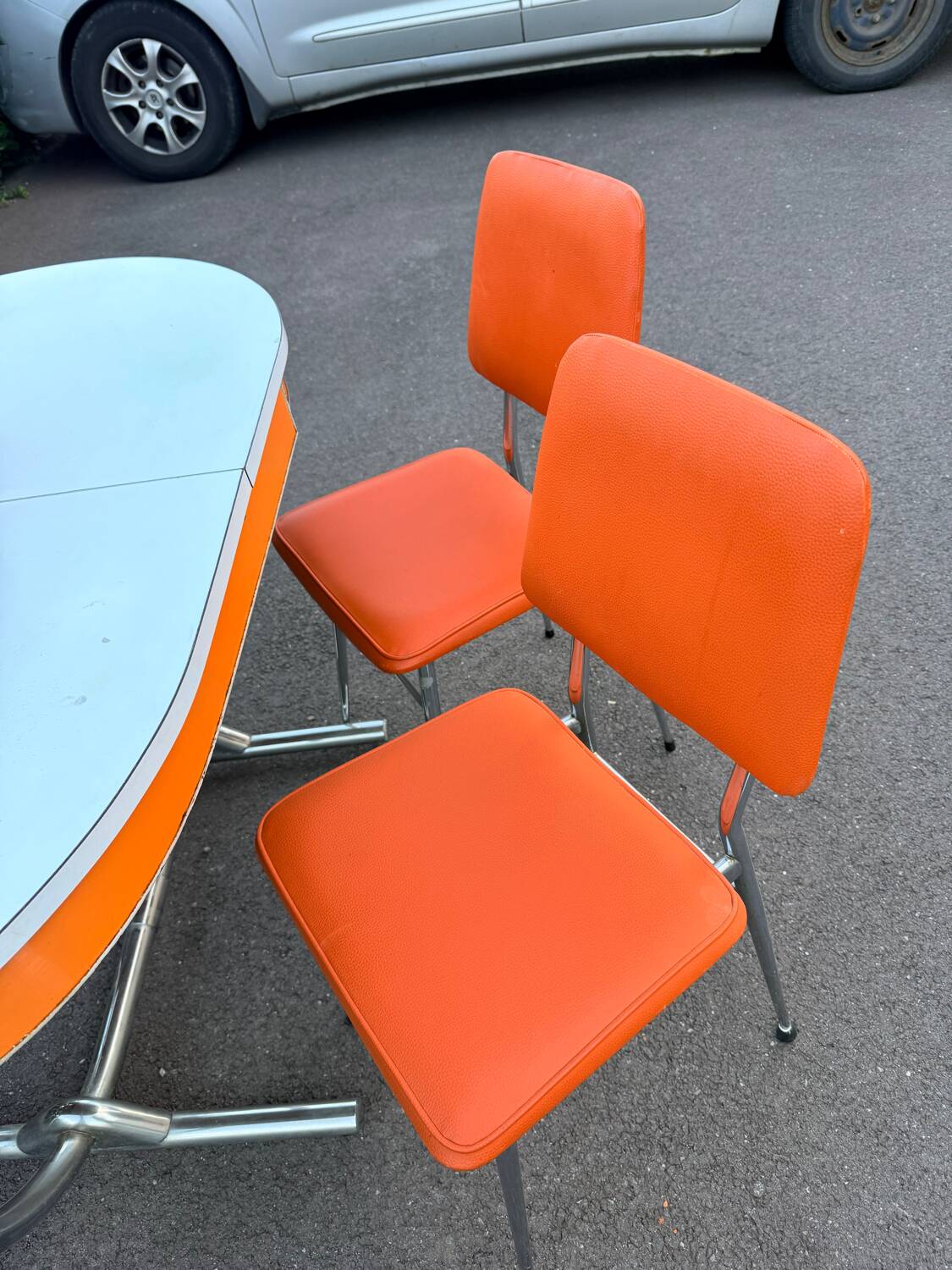 Formica leatherette chair with orange table, vintage 70s Space Age