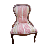 Old wood and fabric armchair