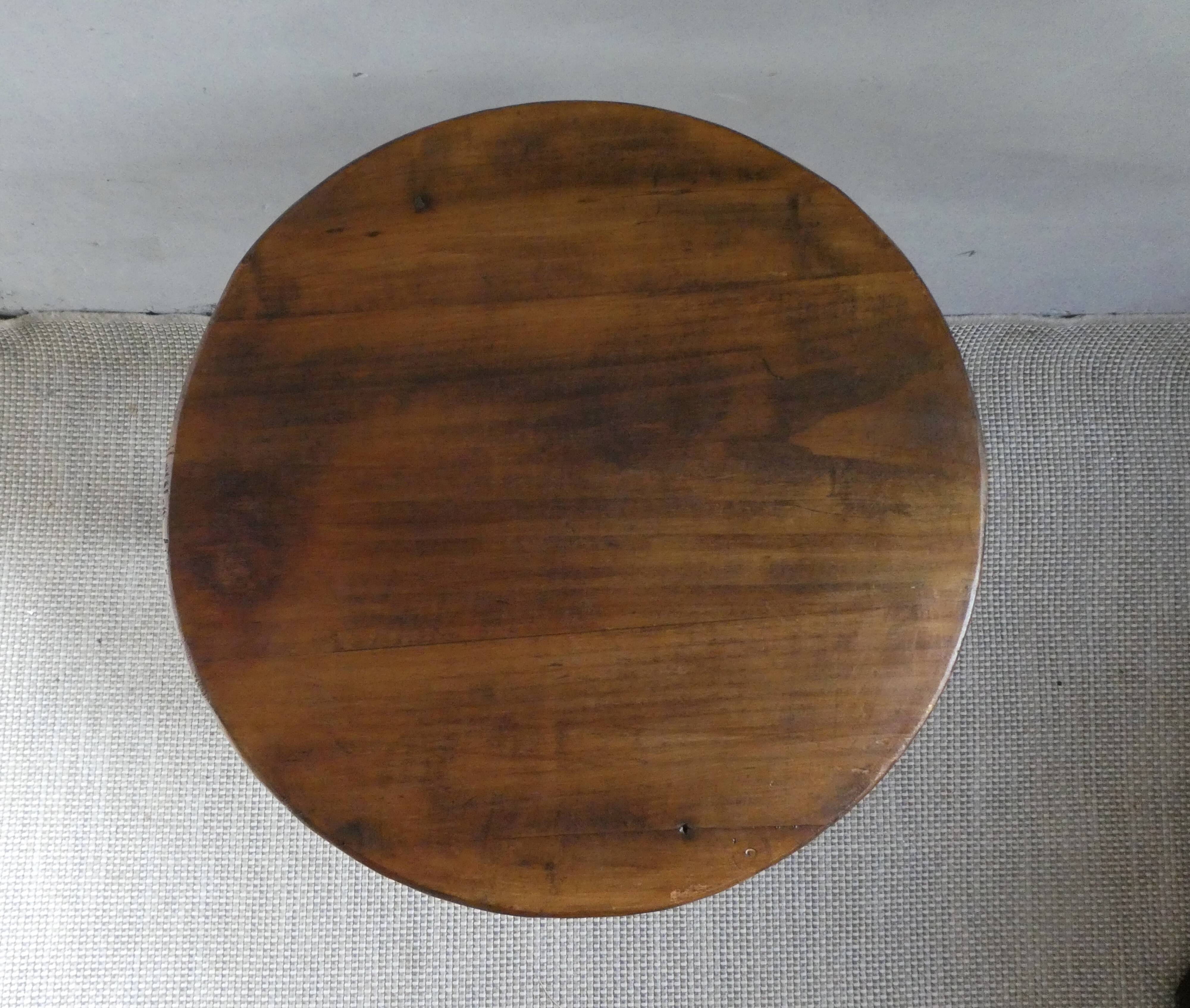 Small table known as a winemaker's table.