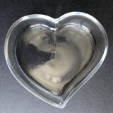 Empty glass heart-shaped pocket