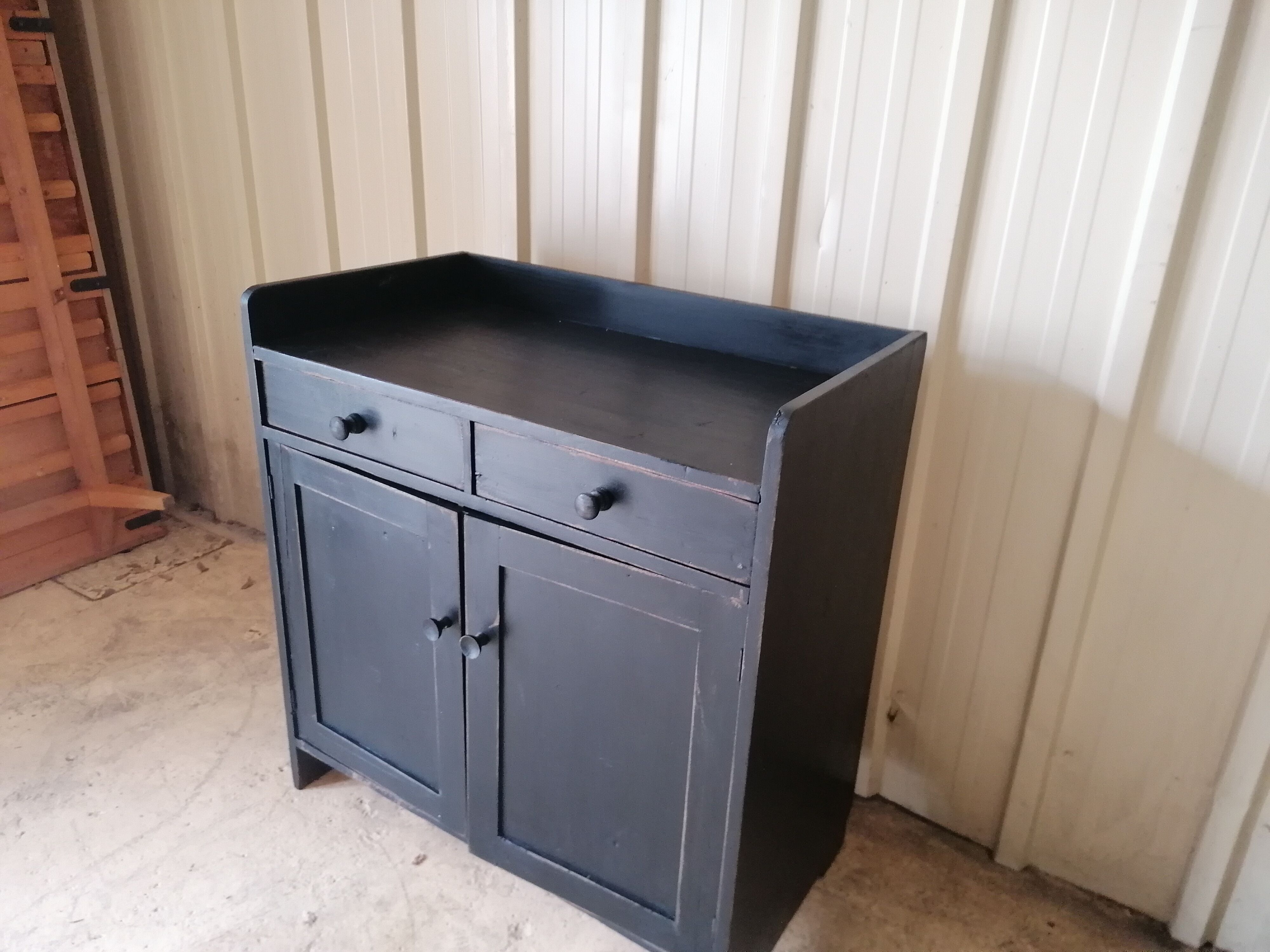 Low wooden entrance furniture