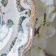 Antique plate in Moustiers faience, hand-painted, decorated with an s