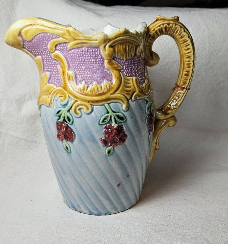 Art nouveau floral decorated barbotine pitcher
